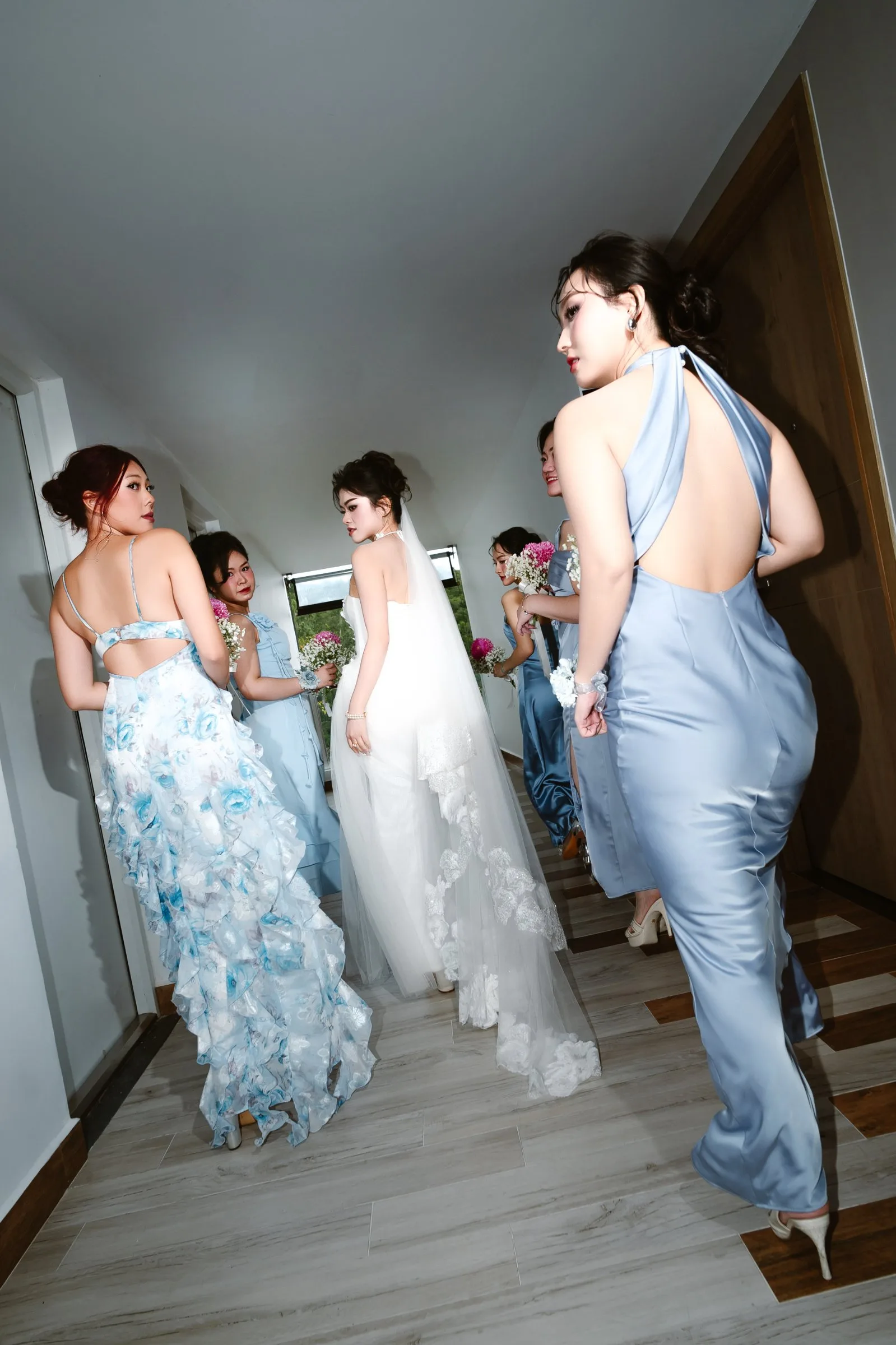 Bride and bridesmaids in blue getting ready for a Nha Trang resort wedding
