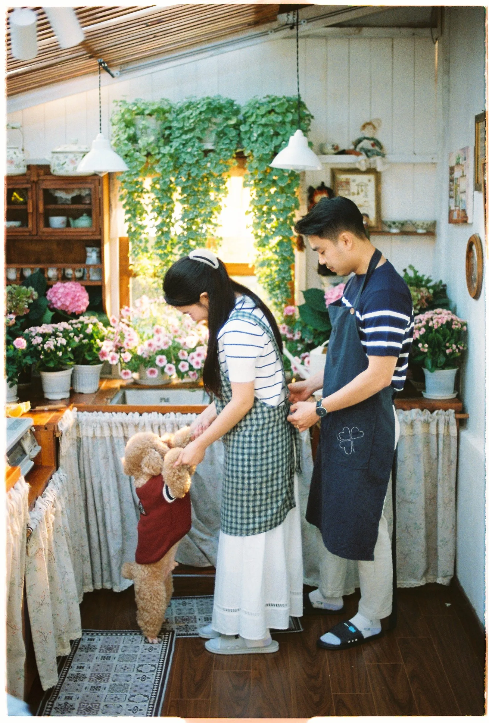 Couple in a cosy flower cafe in Da Lat