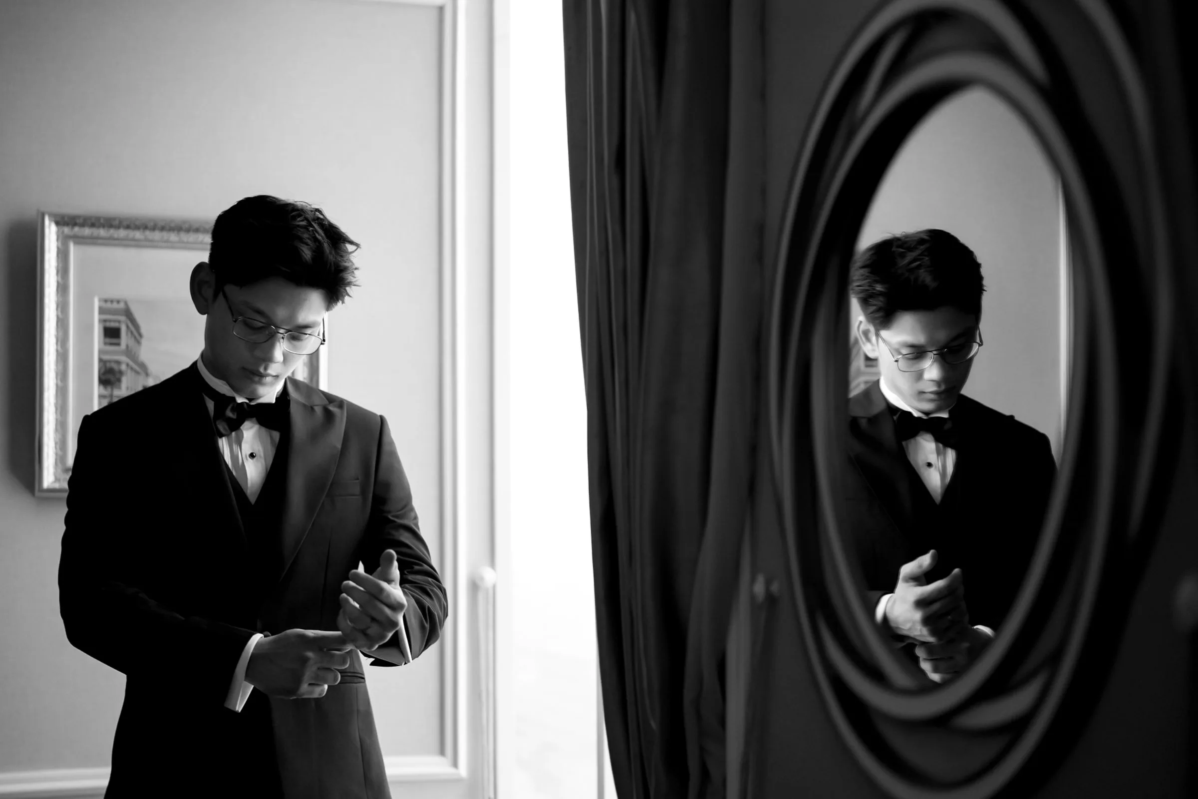 Black and white portrait of the groom before a wedding in central Vietnam by TIMO Wedding
