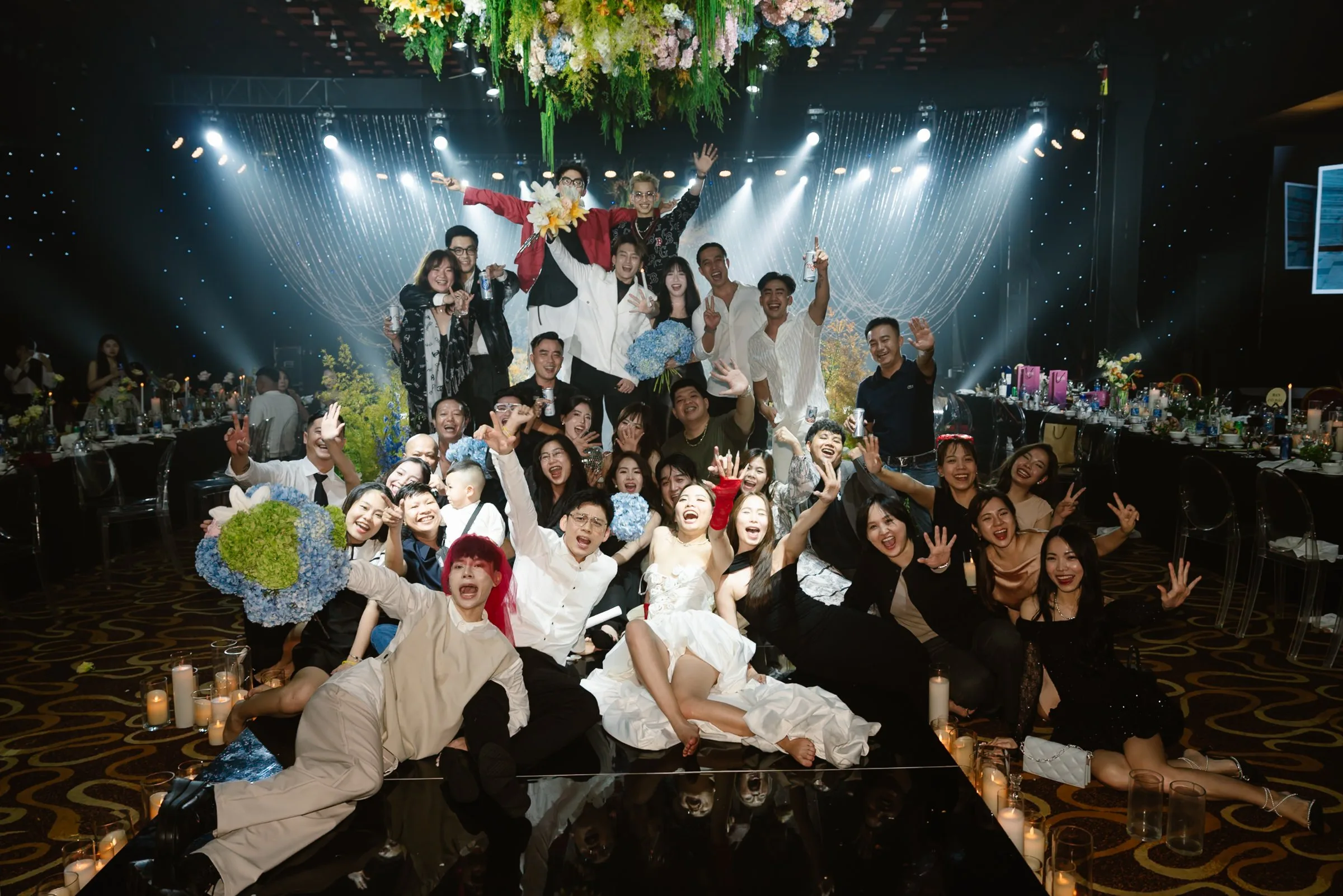 Bride, groom and friends celebrating at a Da Nang wedding near Hoi An