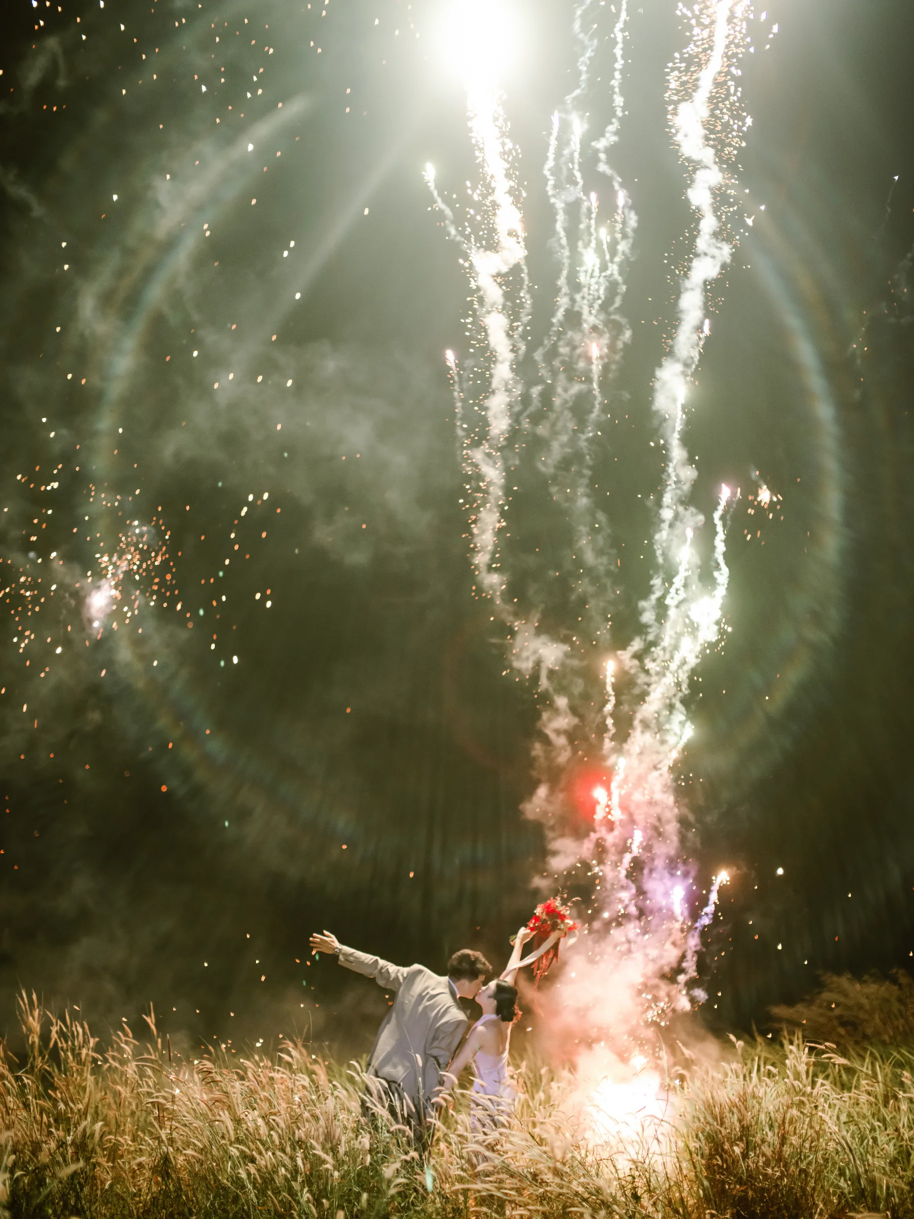 Fireworks over the grass, long after the light had gone.