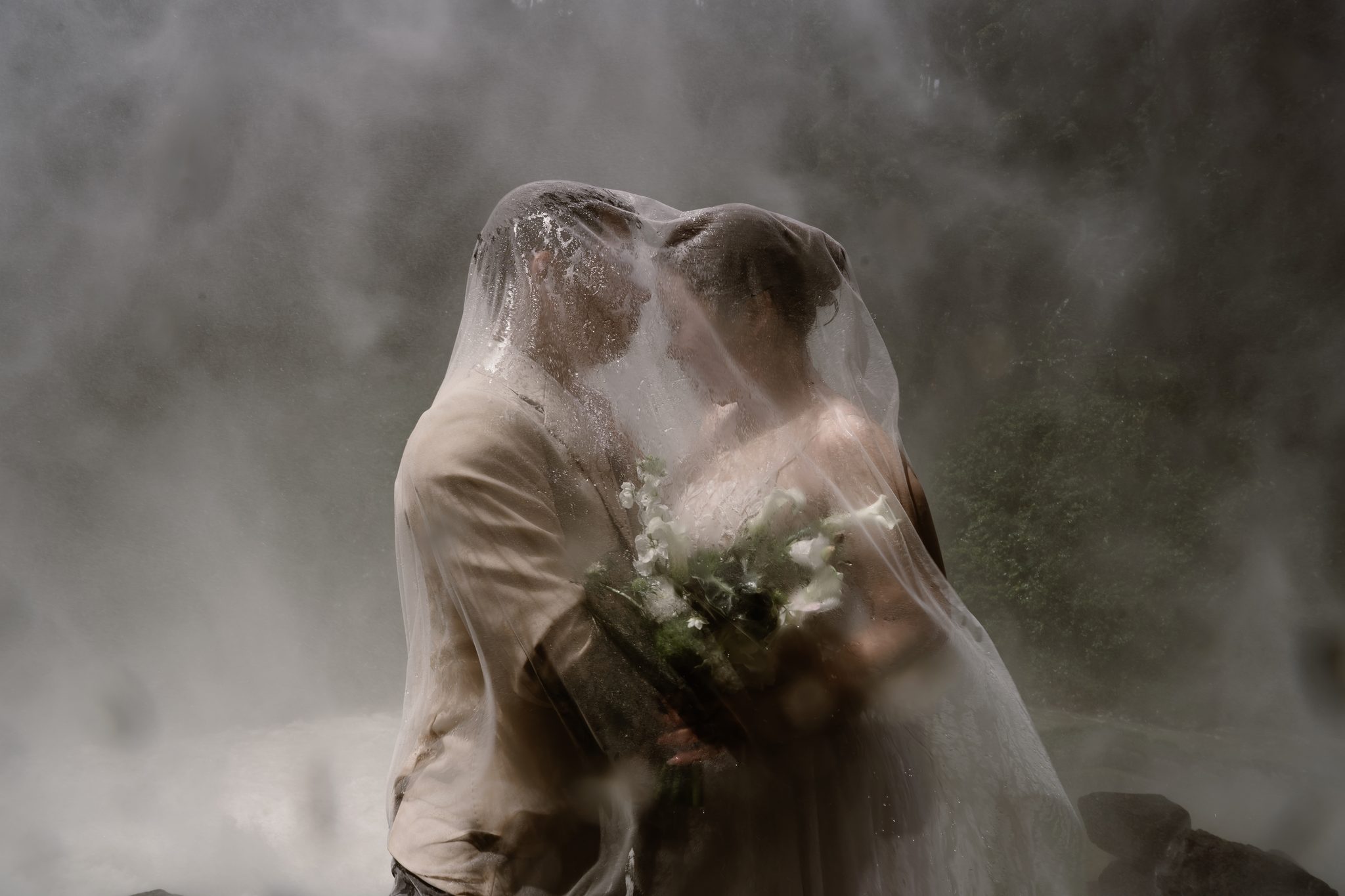 Wrapped in the veil, holding on as the rain came down.