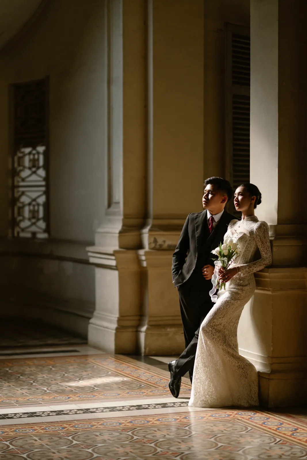 A warm, close moment during their Saigon pre-wedding