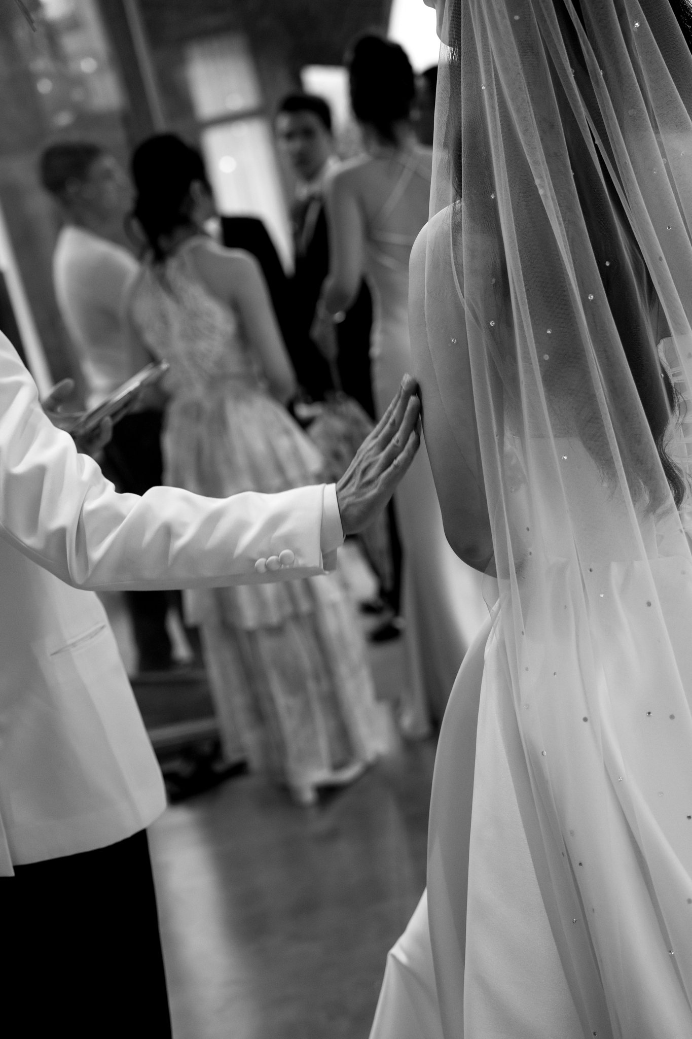 A quiet moment behind the veil.