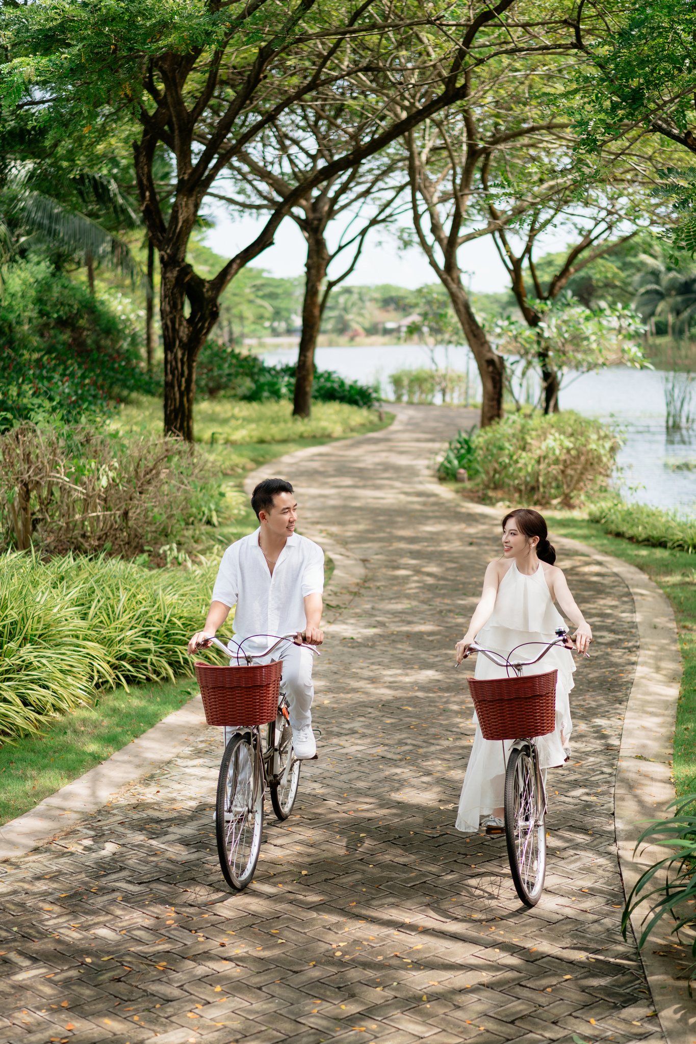 Cycling the tree-lined paths through the resort grounds.