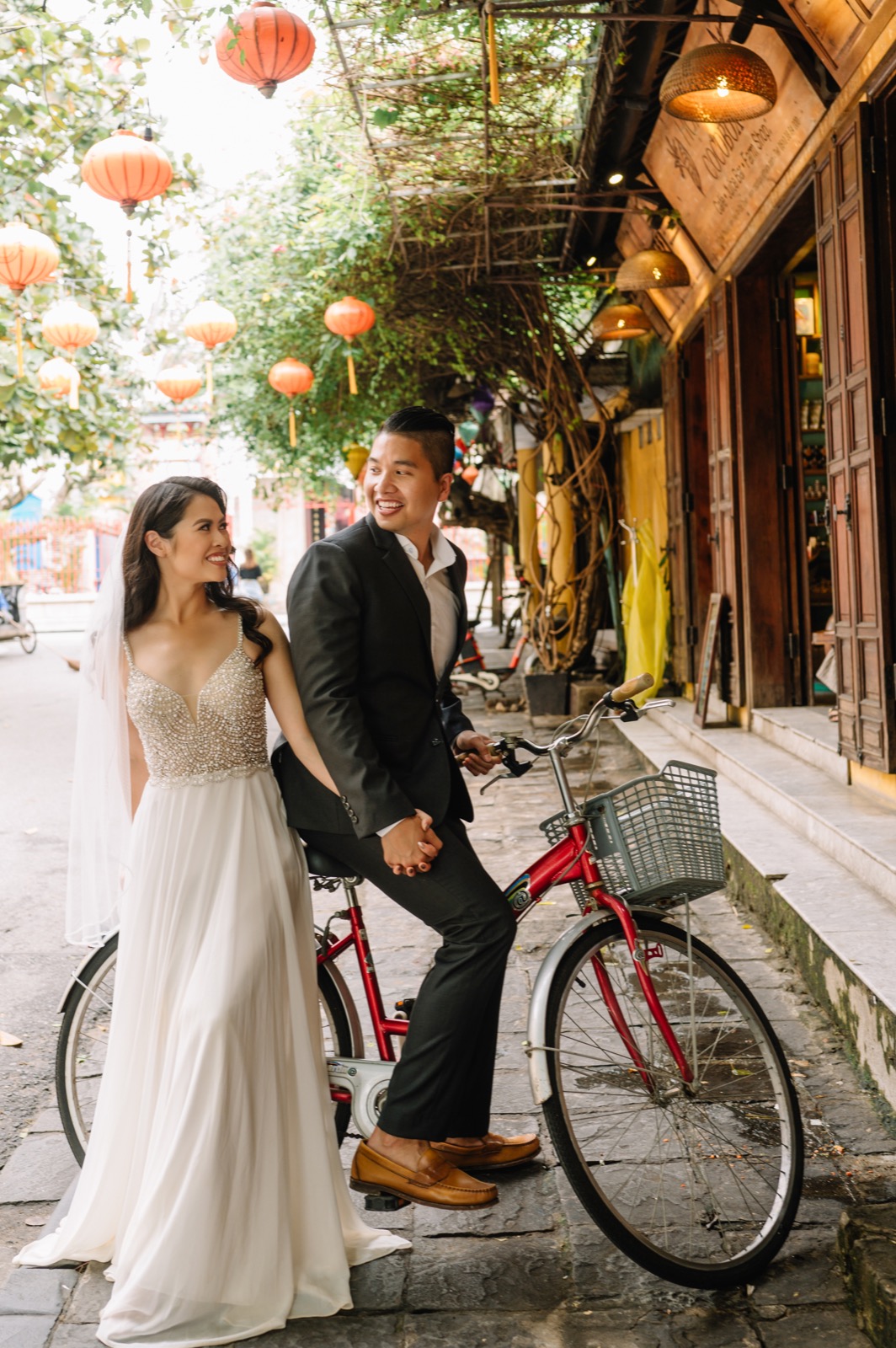 A red bicycle and a canopy of lanterns, pure Hoi An.