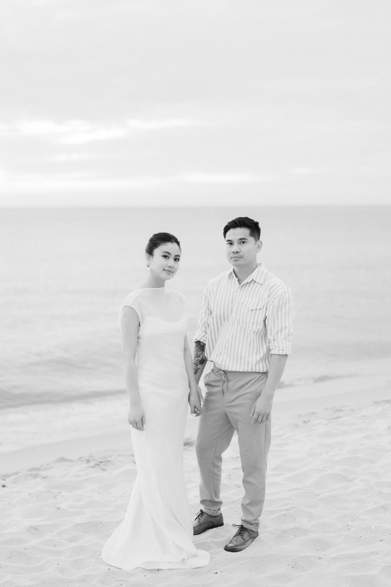 L &amp; Q on the sand, relaxed and unhurried &mdash; exactly how a beach session should feel.