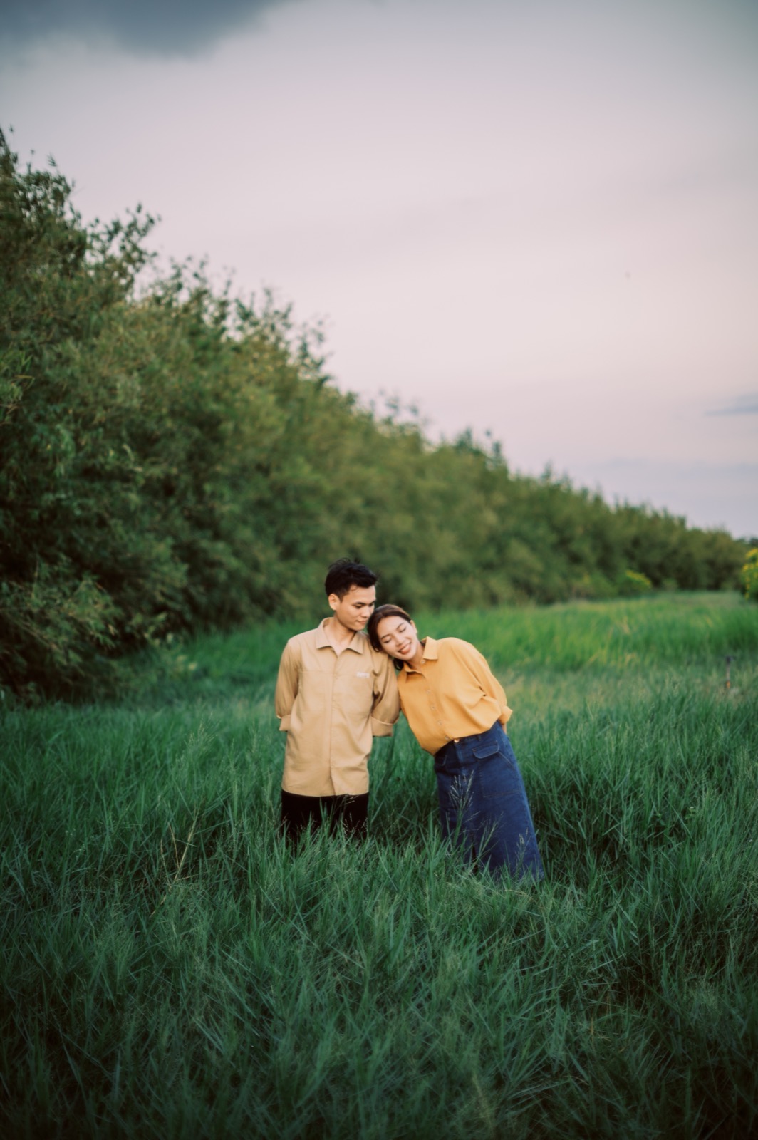 Golden hour in the tall grass, just the two of them.