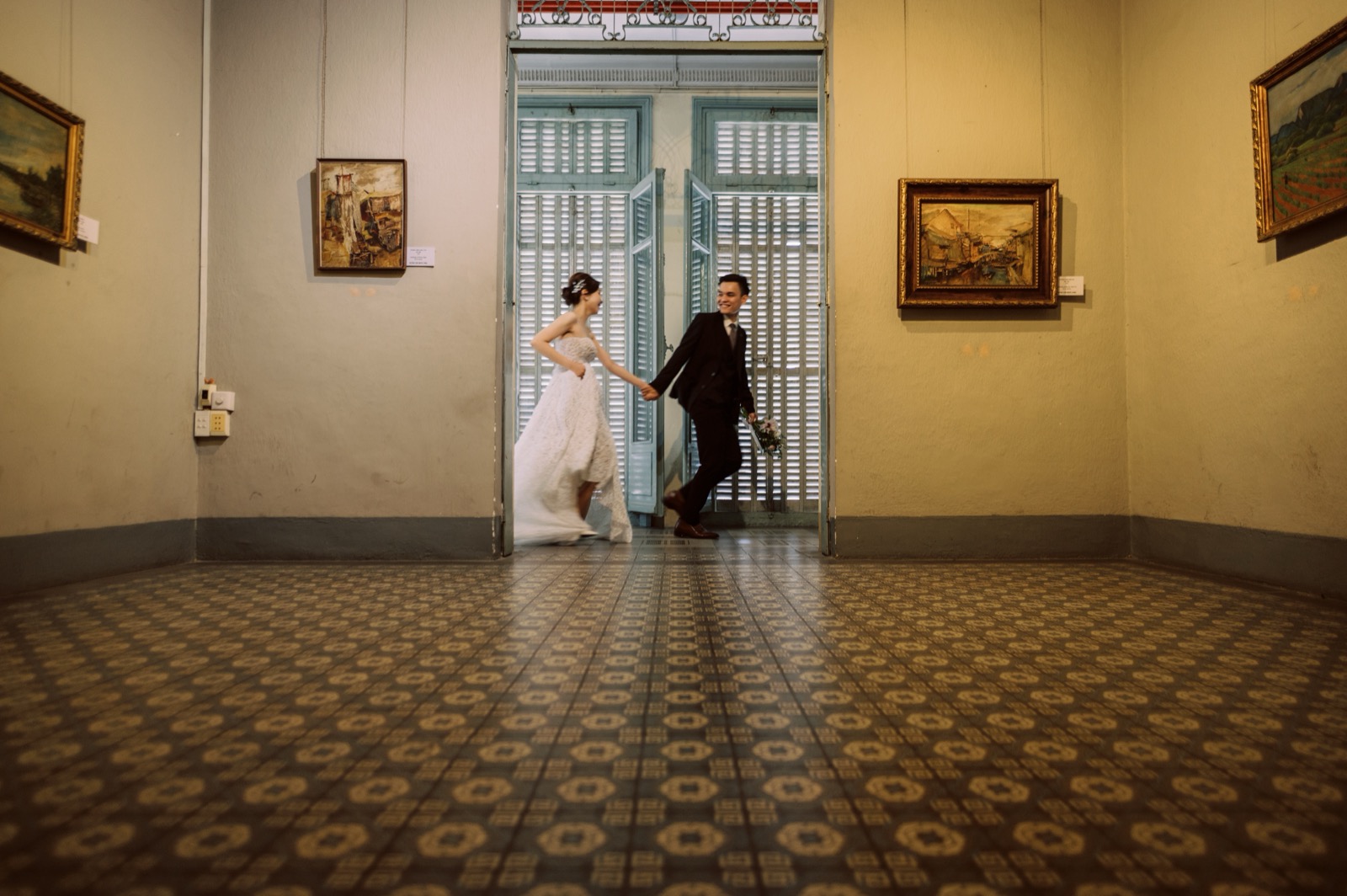 Among the paintings and patterned floors of the museum.