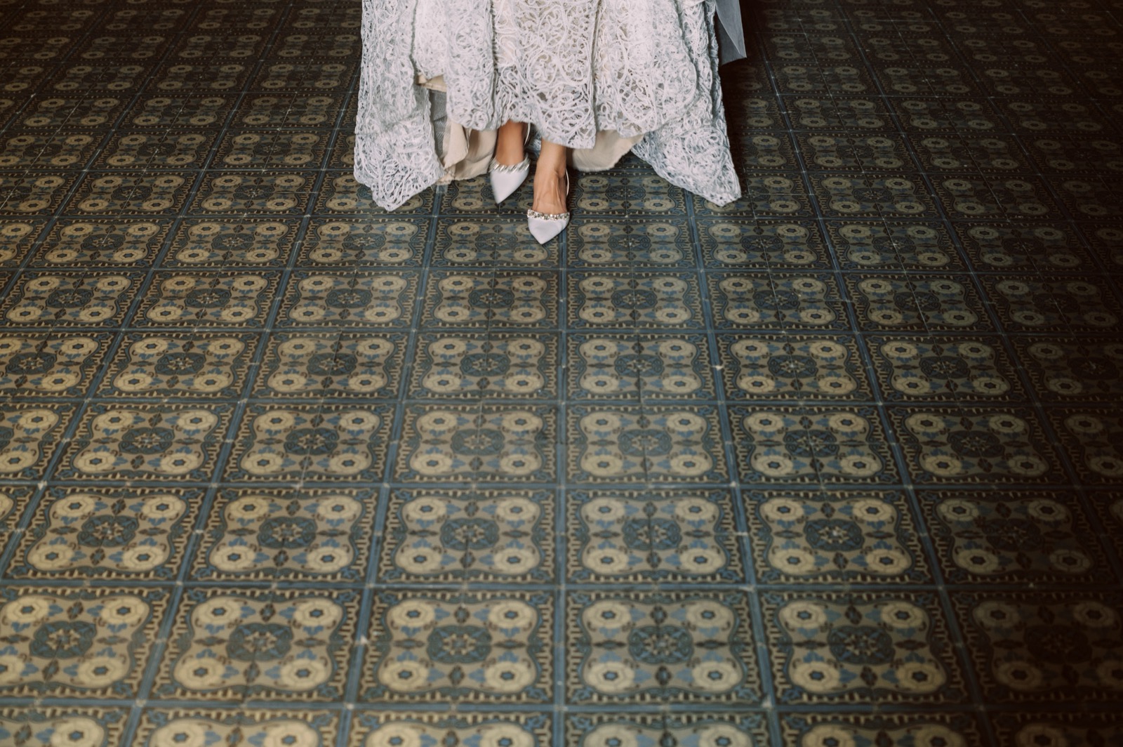 Lace and the museum's antique tiles.