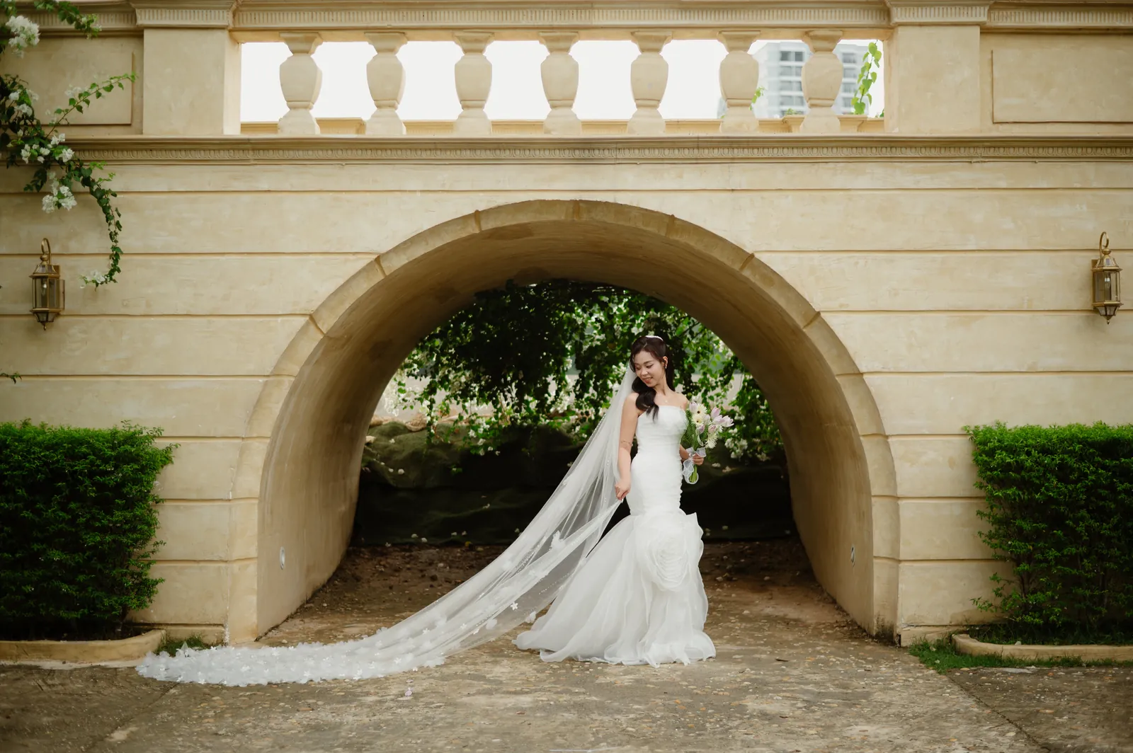 A European stone archway at the Dream Garden studio.