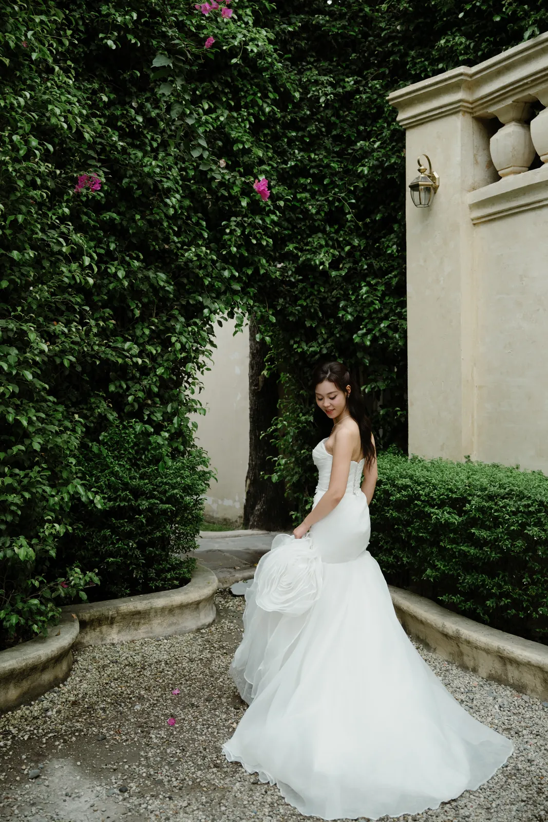 A colonnade softened with greenery.