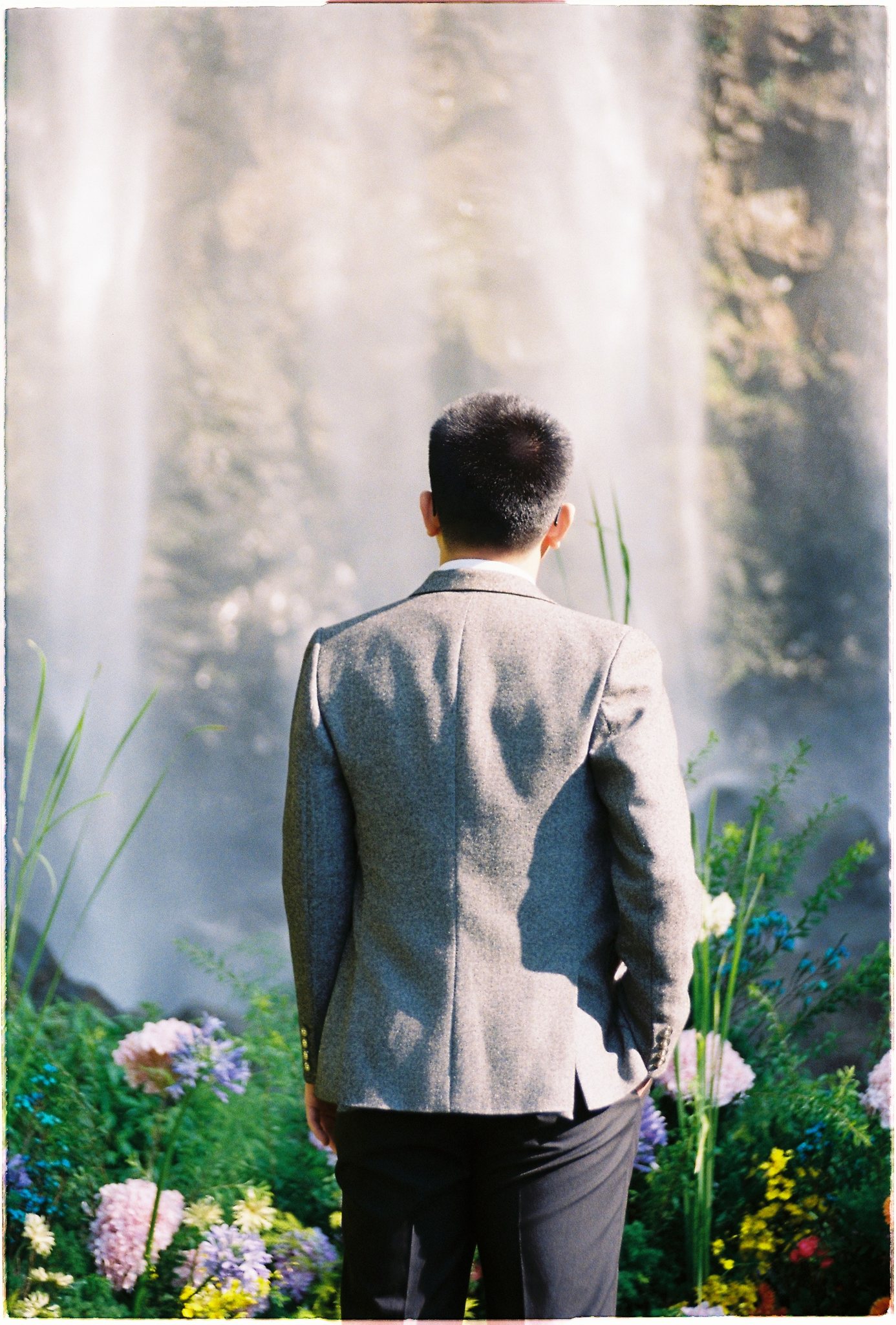 A private elopement vow ceremony beneath Liêng Chi Nha waterfall, Da Lat.