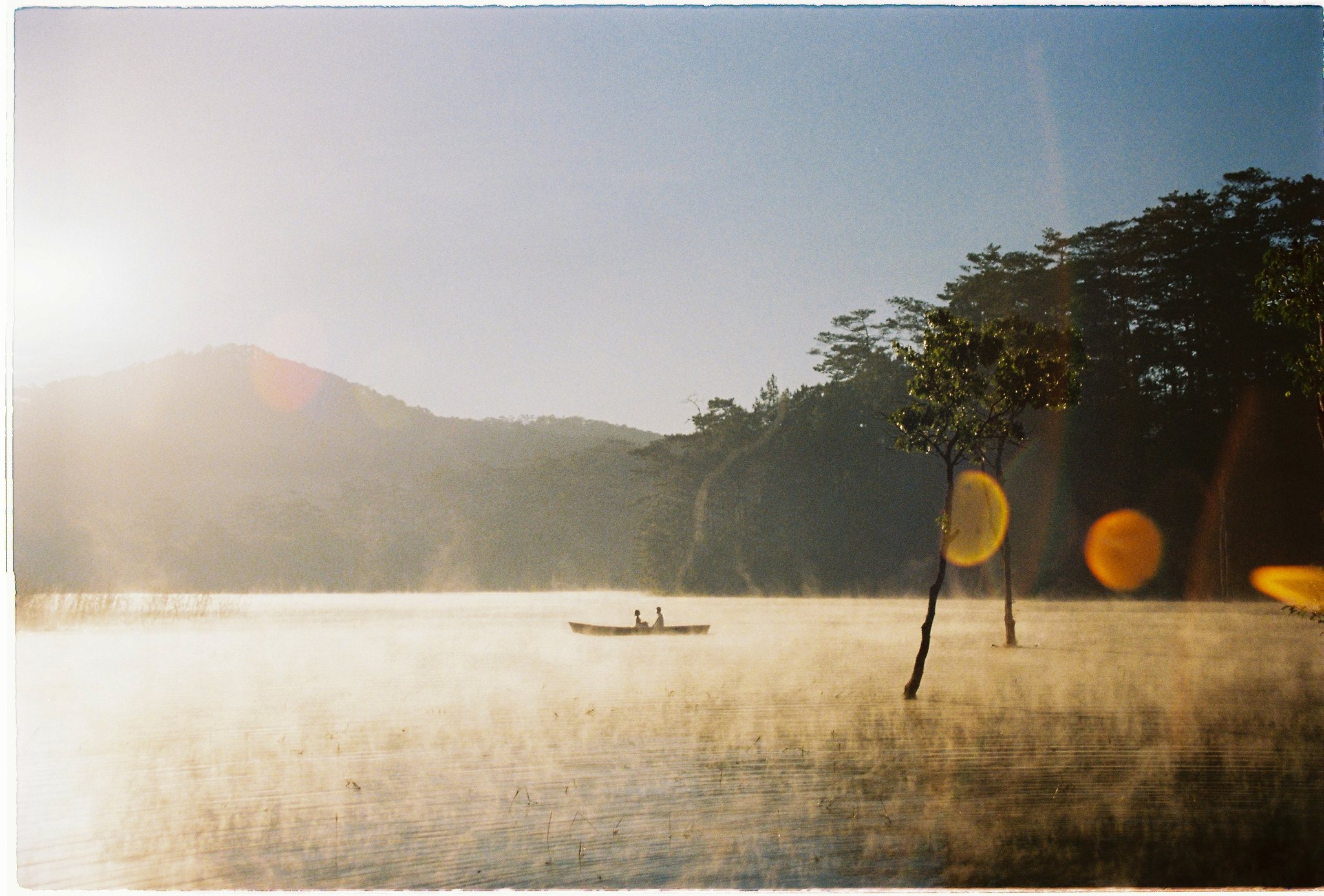 Sunrise mist over the lake at Suối Tía, Da Lat, on the second day of the elopement.