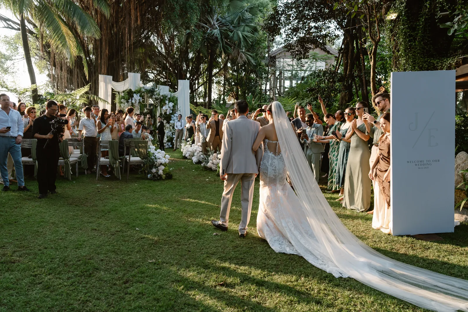 A garden ceremony processional at An Lam Retreats Saigon River