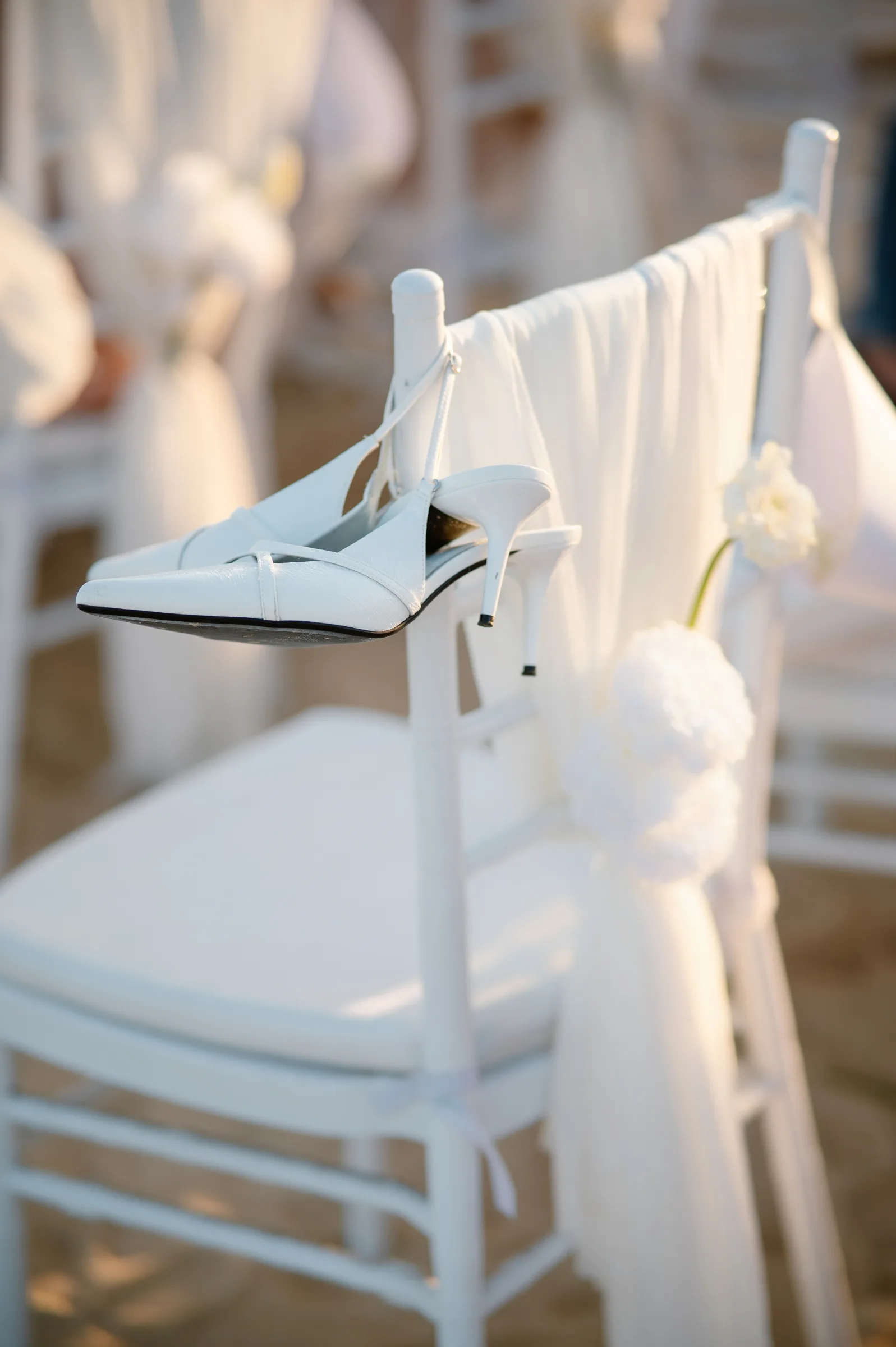 Bridal heels on a chair at a beachfront ceremony, Melia Ho Tram