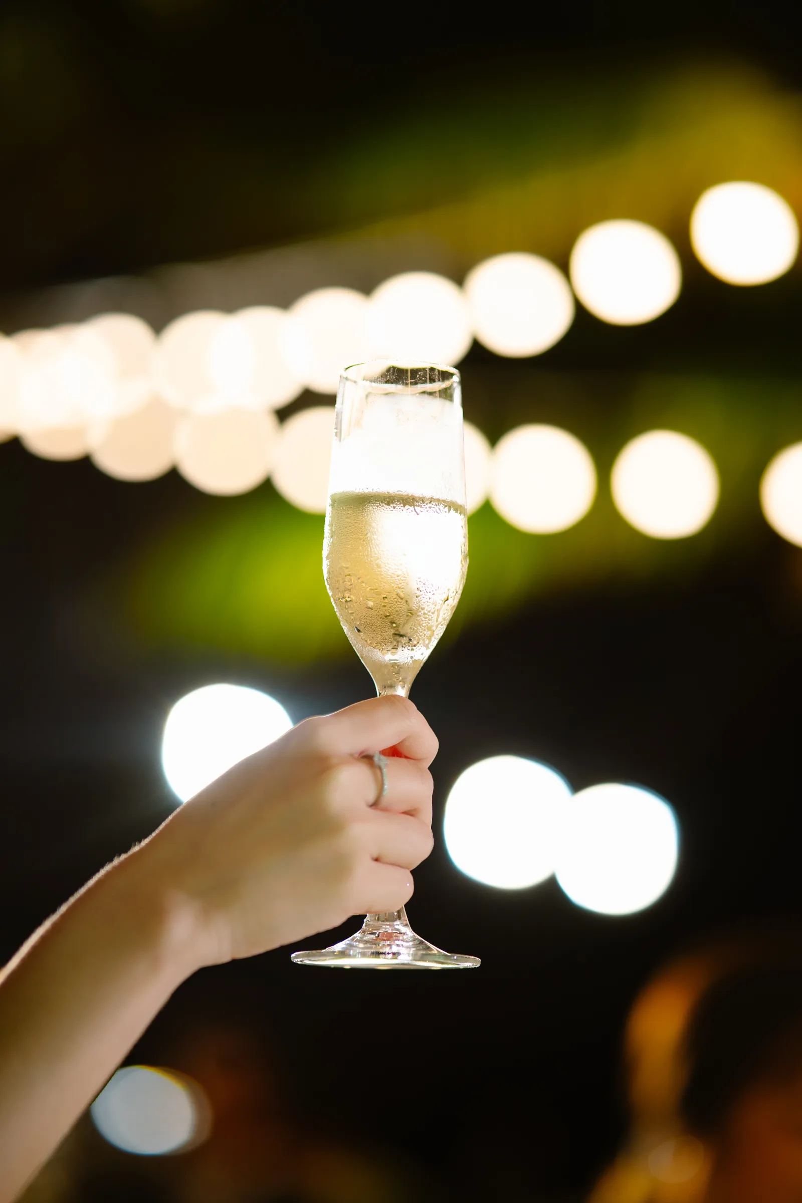A golden-hour champagne toast at a beach wedding, Melia Ho Tram