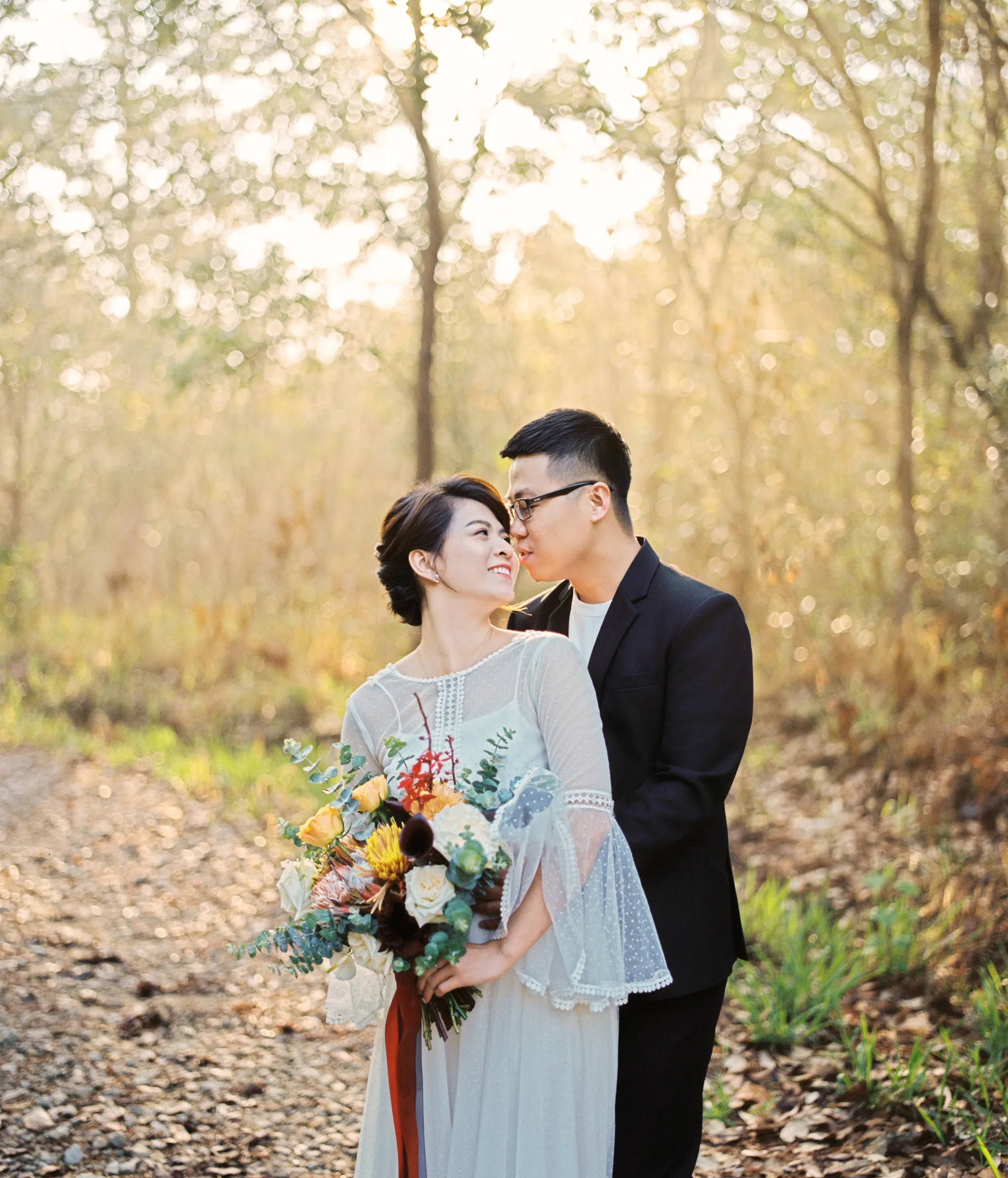 Soft golden light in the pine woods of Da Lat, the cool highland town that is beautiful for pre-weddings all year.
