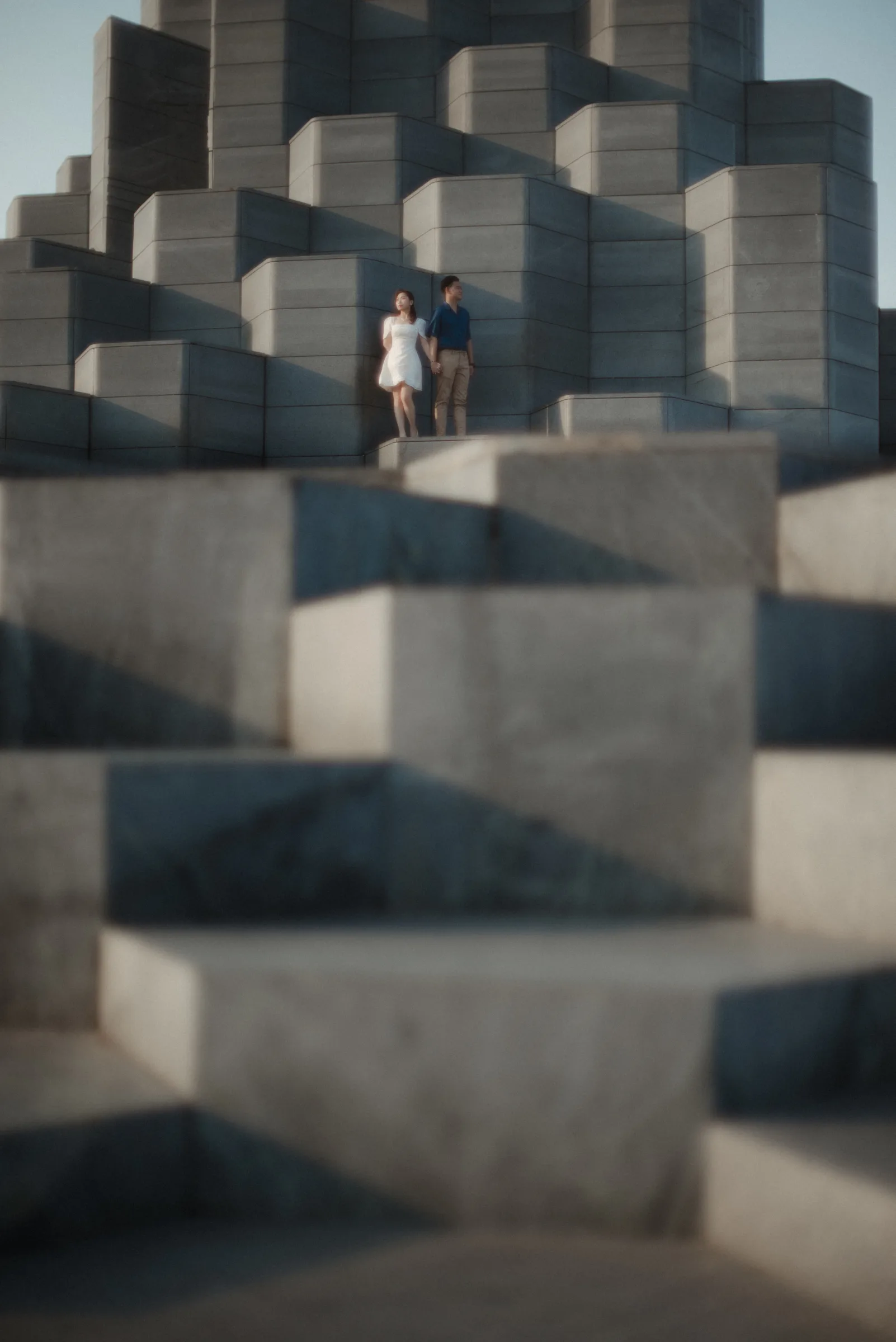 Couple on giant stone blocks at Phu Yen, an artful pre-wedding frame