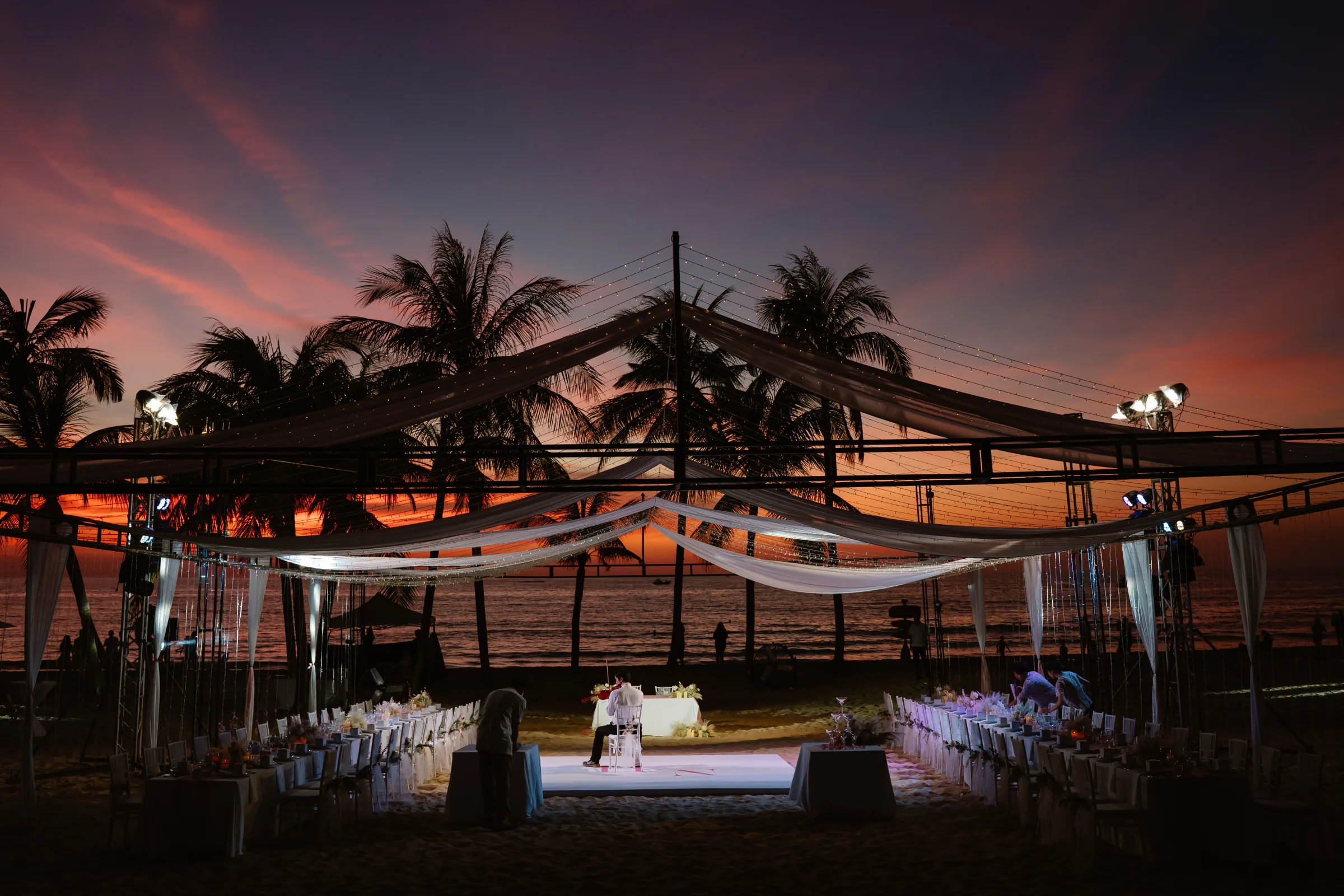 Engagement ring on shimmering sequins, a luxury wedding detail at Phu Quoc