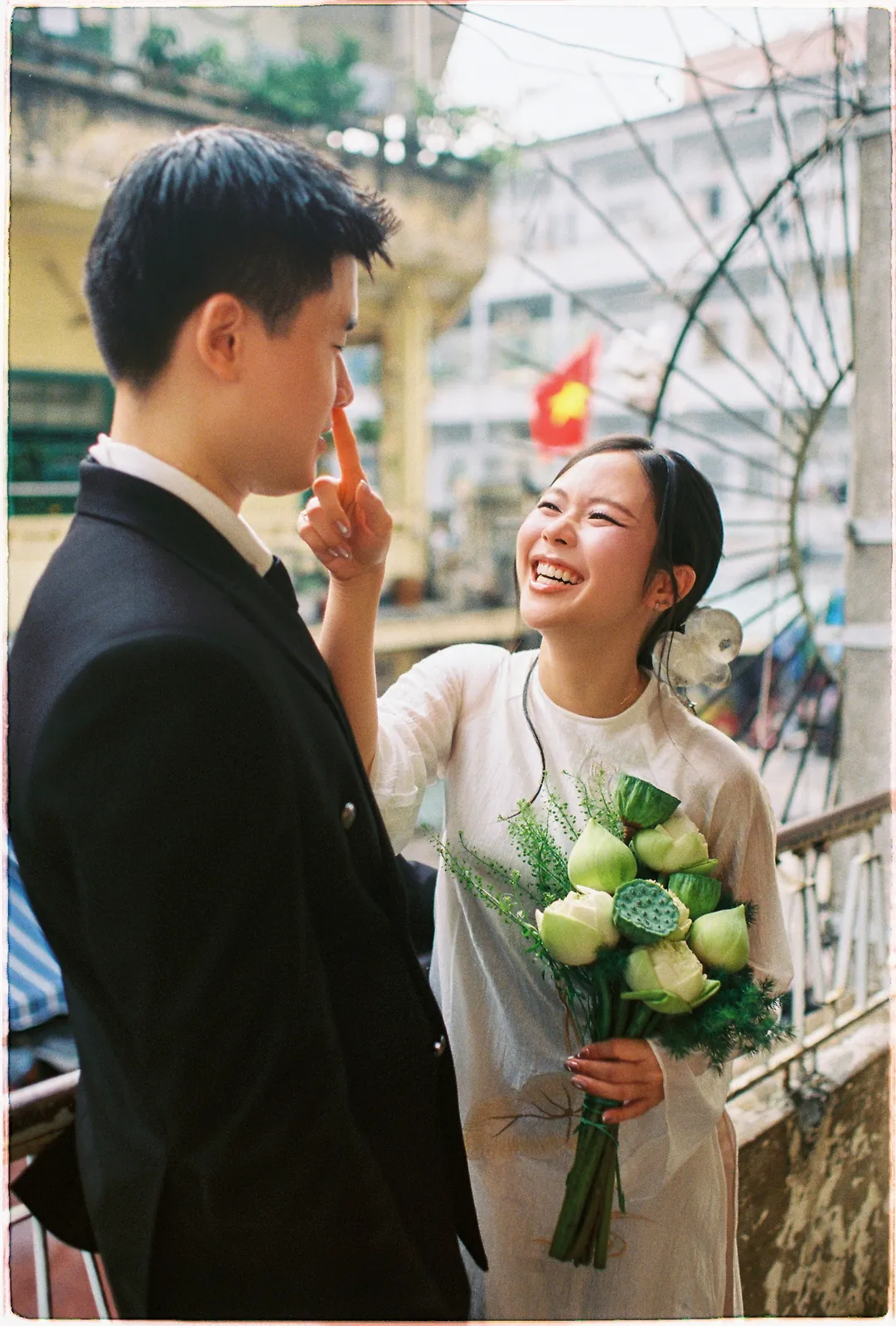 A Saigon Film Pre-Wedding in Three Looks: Áo Dài, Cheongsam and a European Rooftop | Ngọc & Phong