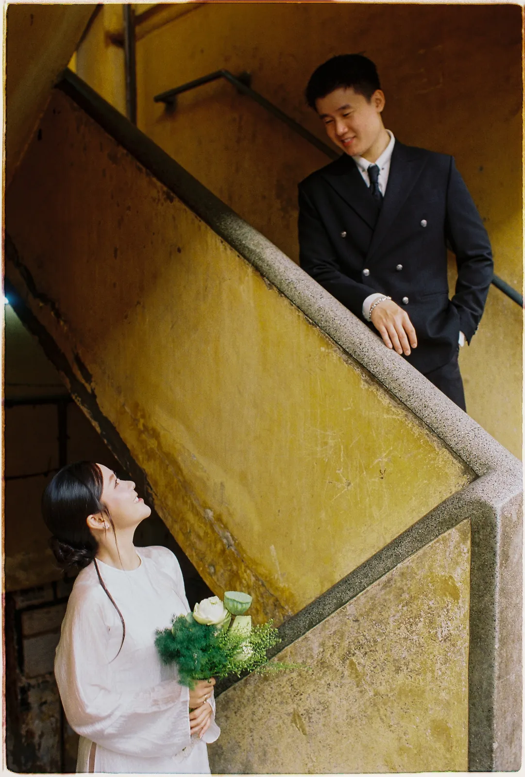 A Saigon Film Pre-Wedding in Three Looks: Áo Dài, Cheongsam and a European Rooftop | Ngọc & Phong
