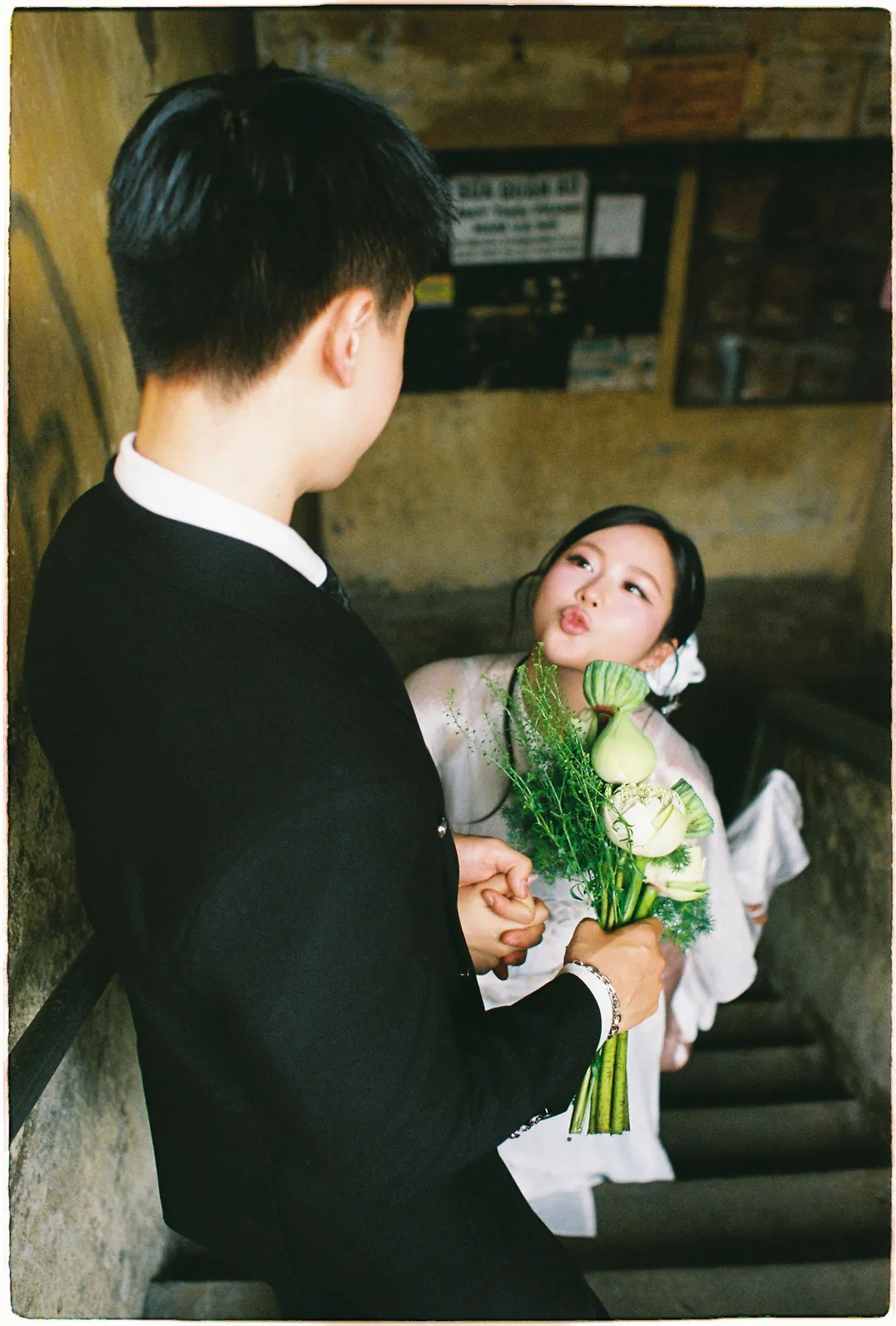 A Saigon Film Pre-Wedding in Three Looks: Áo Dài, Cheongsam and a European Rooftop | Ngọc & Phong