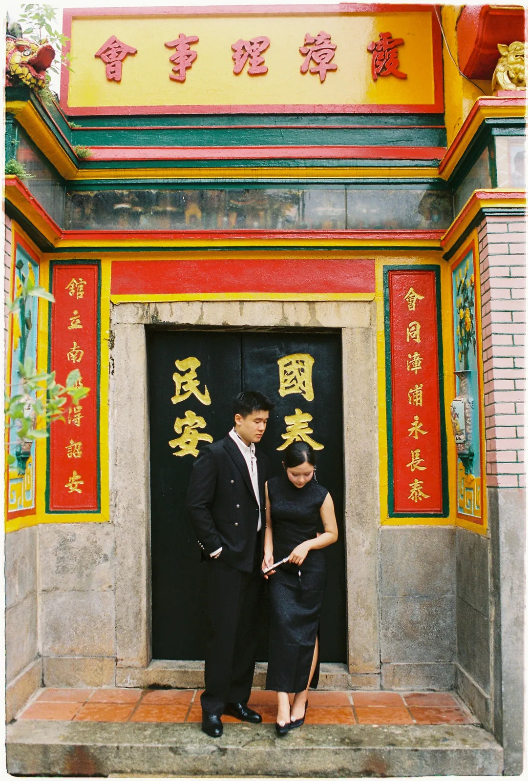 A Saigon Film Pre-Wedding in Three Looks: Áo Dài, Cheongsam and a European Rooftop | Ngọc & Phong