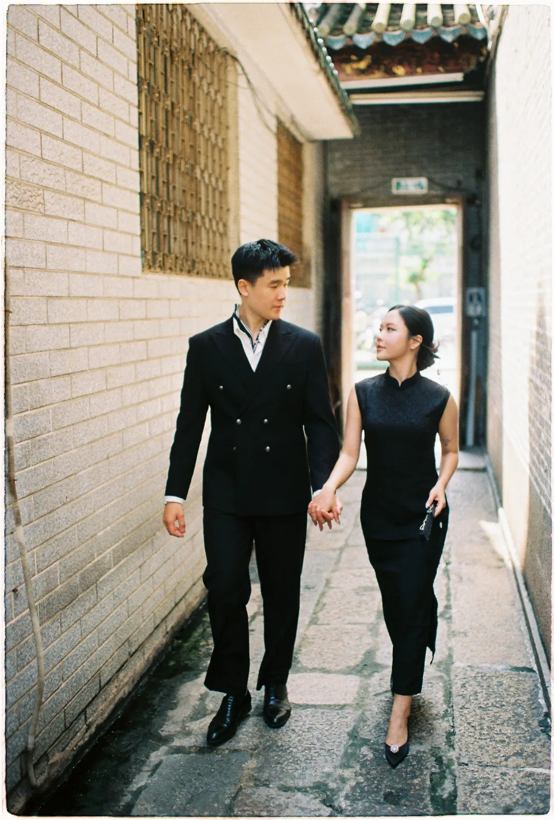 A Saigon Film Pre-Wedding in Three Looks: Áo Dài, Cheongsam and a European Rooftop | Ngọc & Phong