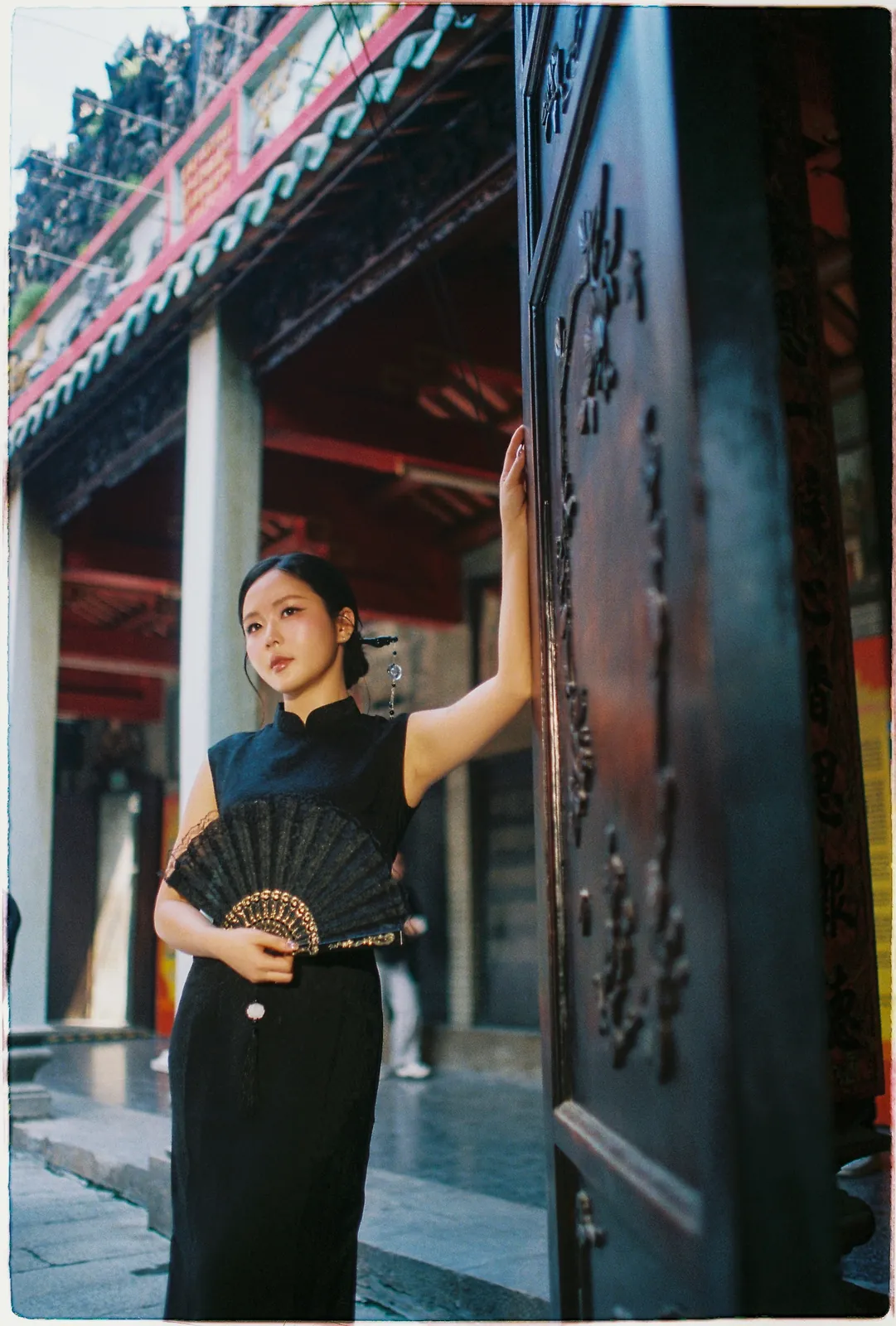 A Saigon Film Pre-Wedding in Three Looks: Áo Dài, Cheongsam and a European Rooftop | Ngọc & Phong