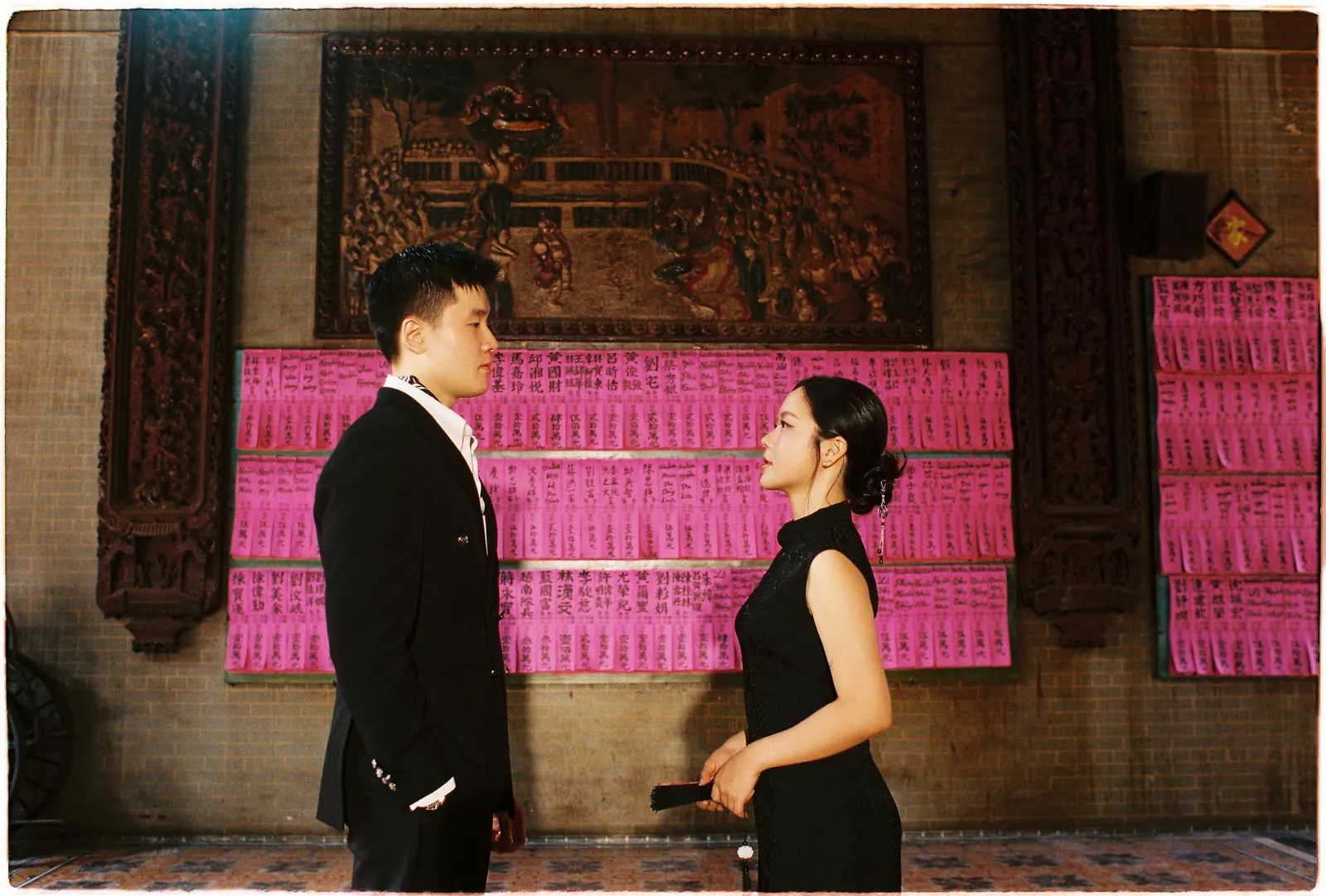 A Saigon Film Pre-Wedding in Three Looks: Áo Dài, Cheongsam and a European Rooftop | Ngọc & Phong