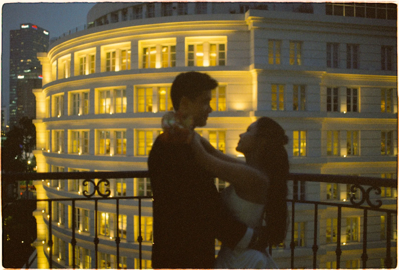 A Saigon Film Pre-Wedding in Three Looks: Áo Dài, Cheongsam and a European Rooftop | Ngọc & Phong