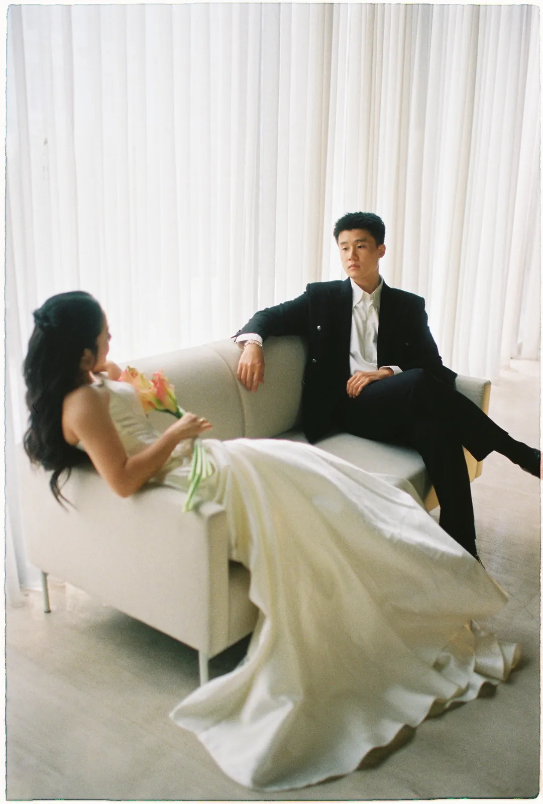 A Saigon Film Pre-Wedding in Three Looks: Áo Dài, Cheongsam and a European Rooftop | Ngọc & Phong