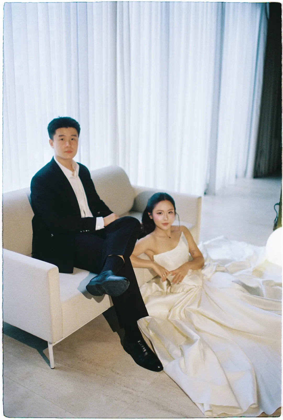 A Saigon Film Pre-Wedding in Three Looks: Áo Dài, Cheongsam and a European Rooftop | Ngọc & Phong