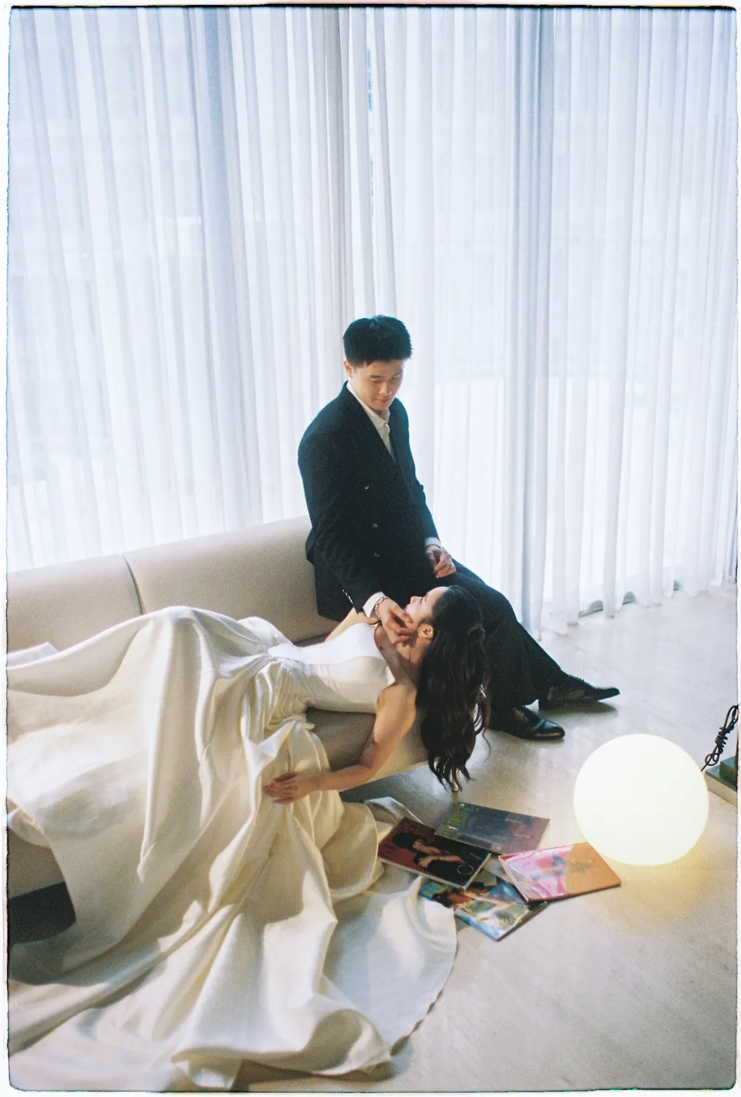A Saigon Film Pre-Wedding in Three Looks: Áo Dài, Cheongsam and a European Rooftop | Ngọc & Phong