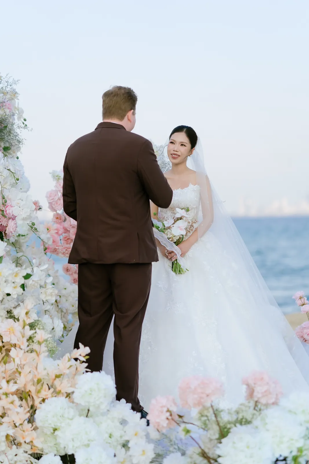 Exchanging vows on the sand.